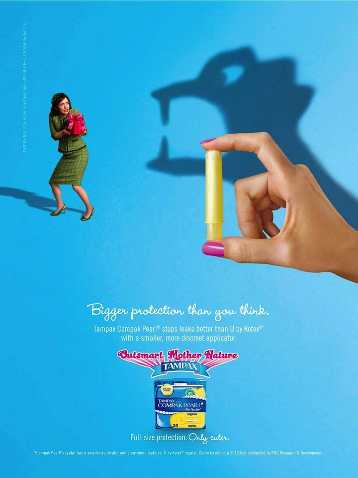 Period Care & Feminine Hygiene creative ad: Hand holding small tampon casting monster shadow over scared woman