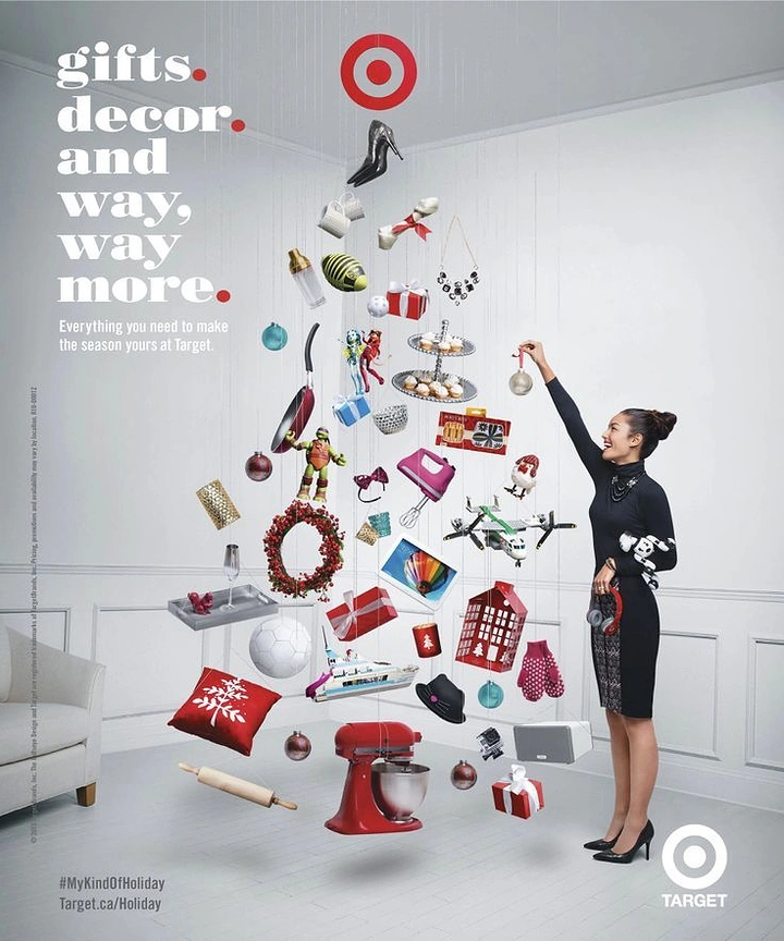 Christmas creative ad: Dozens of suspended gift products forming a Christmas tree shape, woman hanging an ornament