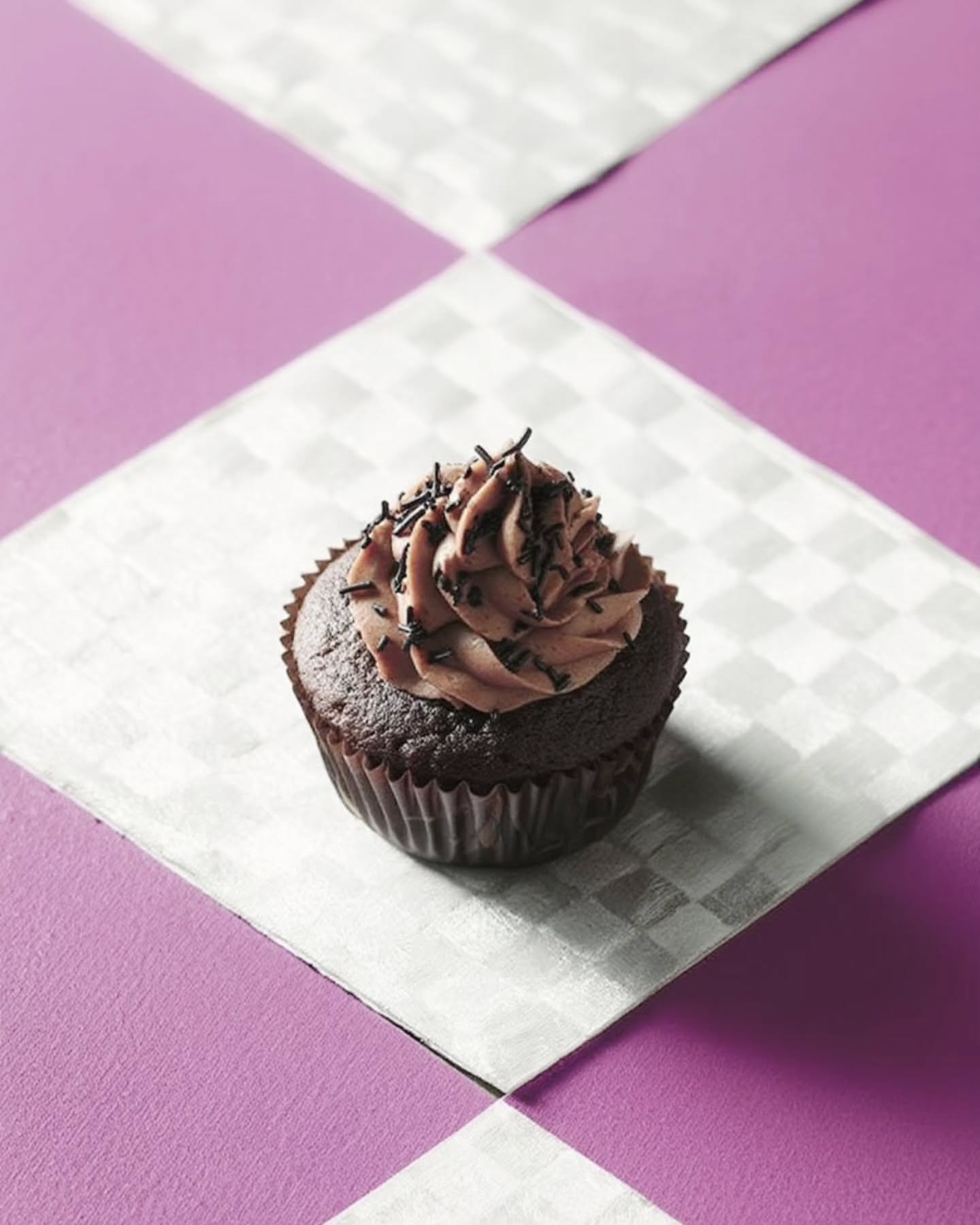 Carousel: Top-down checkers game played with cookies and cupcakes, slide 3