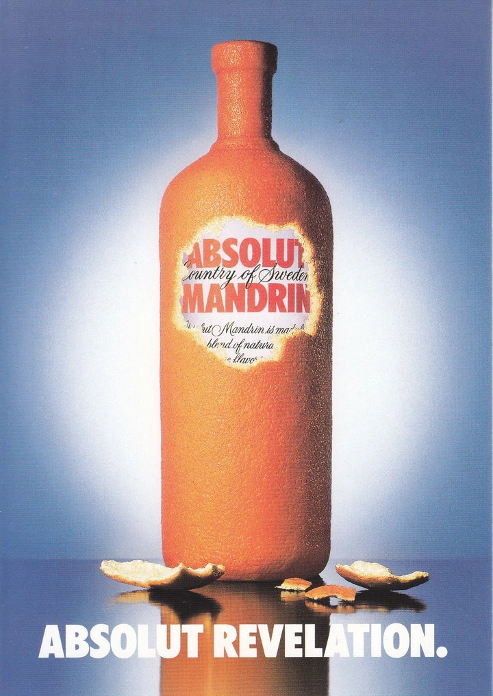 Creative ad: Vodka bottle wrapped in orange peel with label revealed through a peeled patch