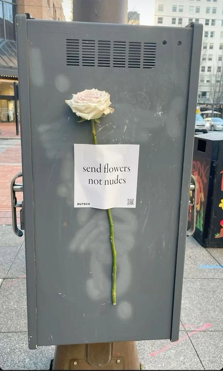 Florists creative ad: Guerrilla rose taped: send flowers not nudes