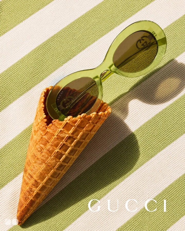 Creative ad: Green oval sunglasses tucked into an empty waffle cone