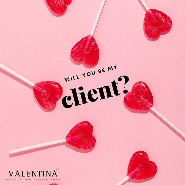 Valentine's Day creative ad: Red heart-shaped lollipops scattered on pink