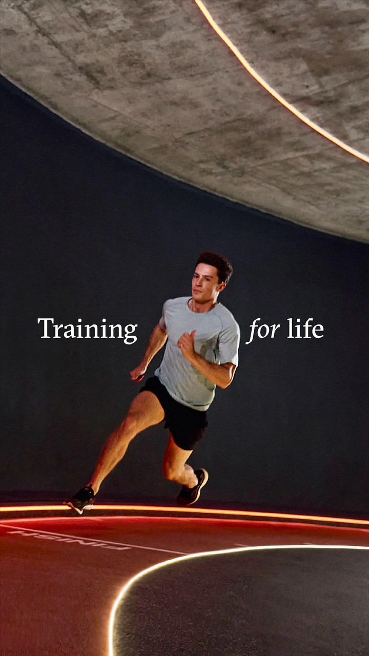 Fitness Equipment Stores creative ad: Neon path visualizes lifelong training