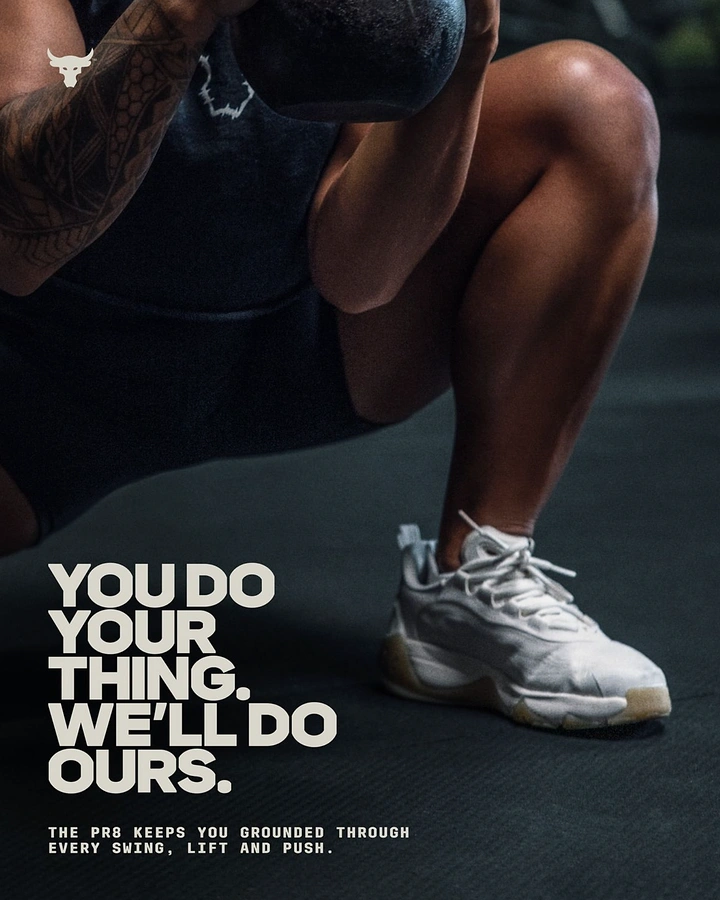 Creative ad: Close crop of athlete in deep squat with kettlebell, white training shoe