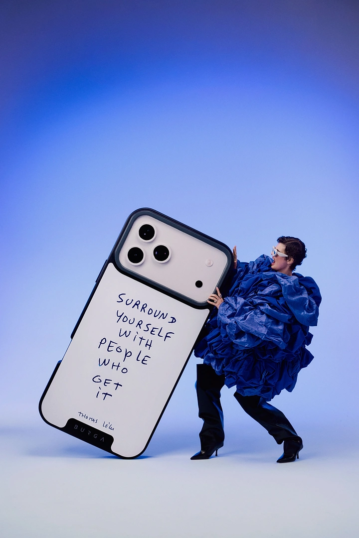 Phone Cases & Mobile Accessories creative ad: Tiny figure beside giant case