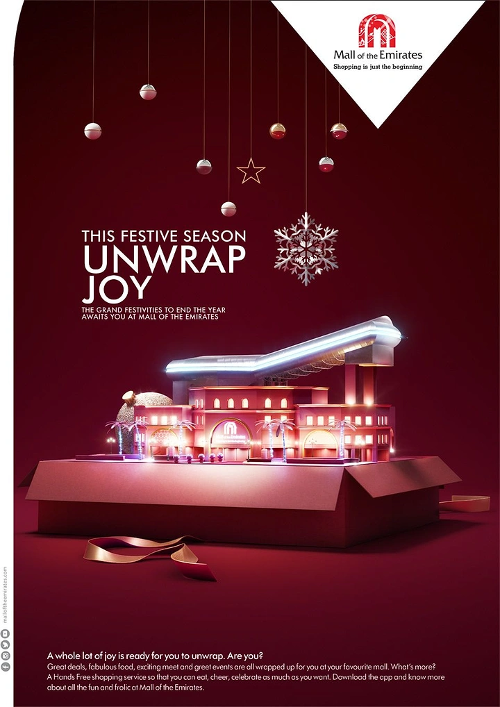 Christmas creative ad: Glowing miniature mall model emerging from an open gift box