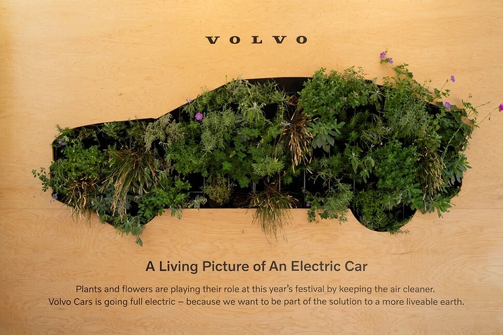 Automotive creative ad: Car-shaped cutout filled with living plants