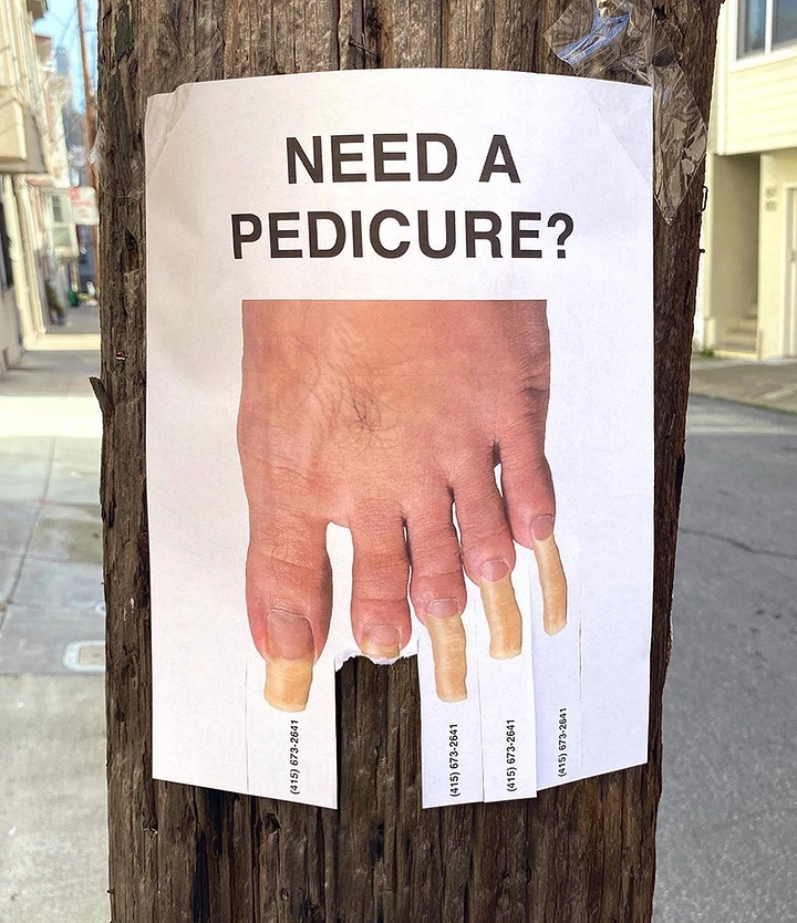 Spa & Massage creative ad: Foot whose overgrown toenails are the flyer's tear-off tabs