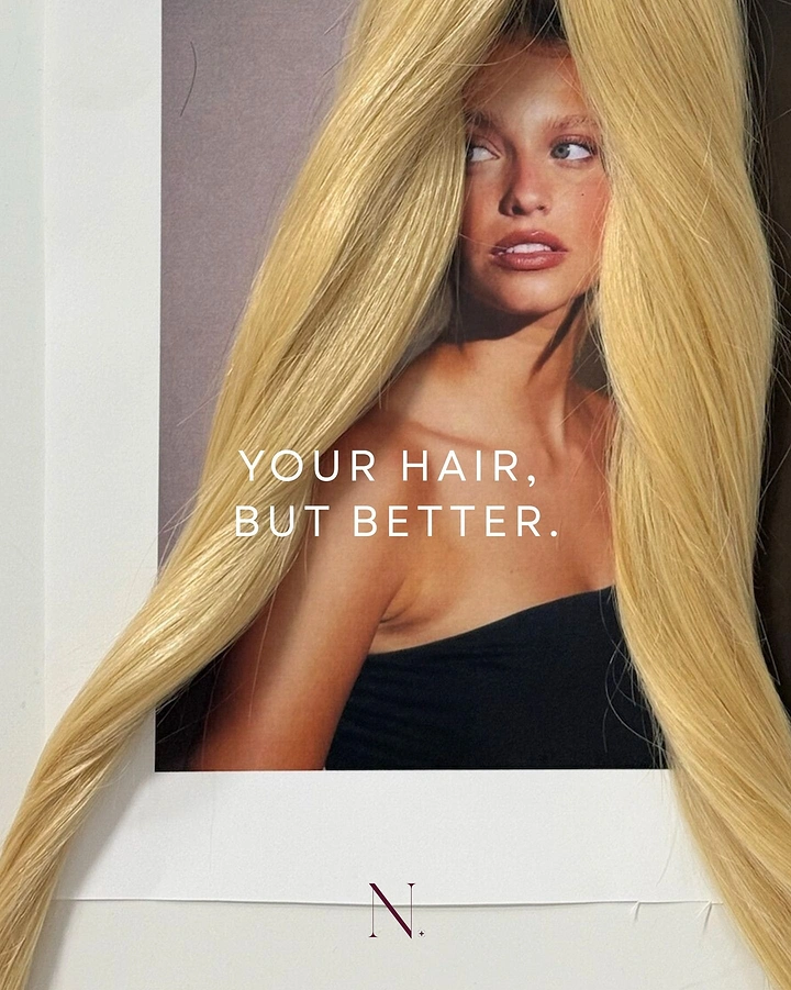Wigs & Hair Extensions creative ad: Real blonde hair wefts draped over a printed portrait of a model