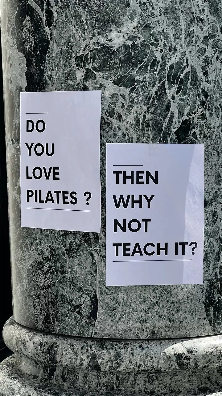 Pilates Studios creative ad: Marble placards create striking recruitment metaphor