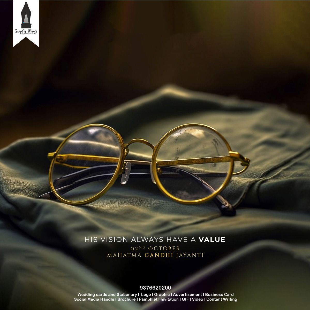 Gold round-rim spectacles resting on folded olive cloth