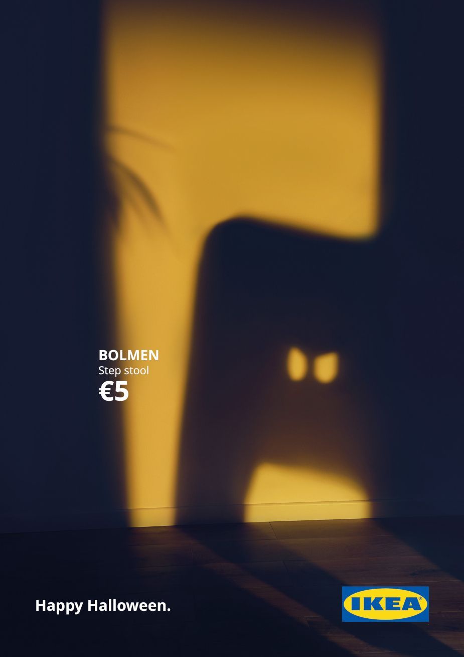 Step stool shadow forming a monster face on a wall
