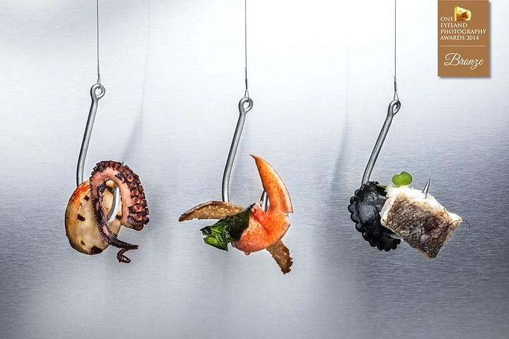 Seafood Restaurants creative ad: Hanging seafood creates striking still life