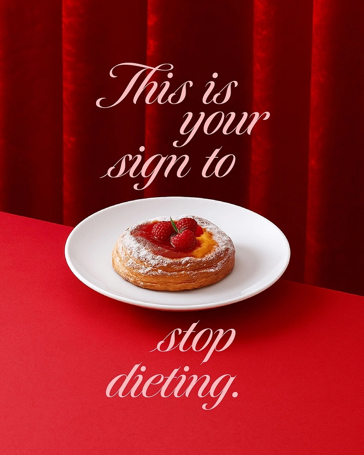 Creative ad: Raspberry custard danish on a white plate before a red velvet curtain