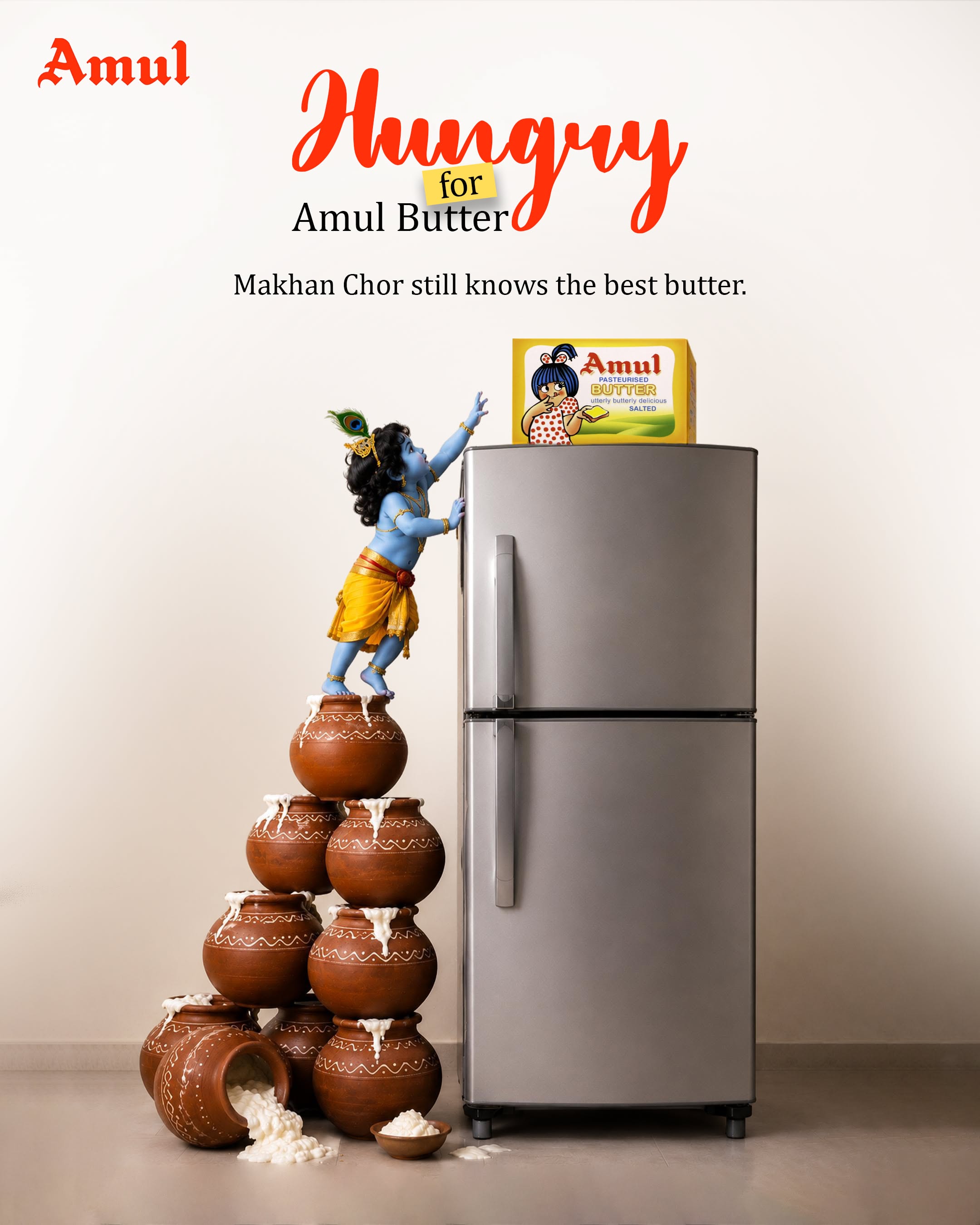 Baby Krishna on stacked clay pots reaching for a butter pack atop a fridge