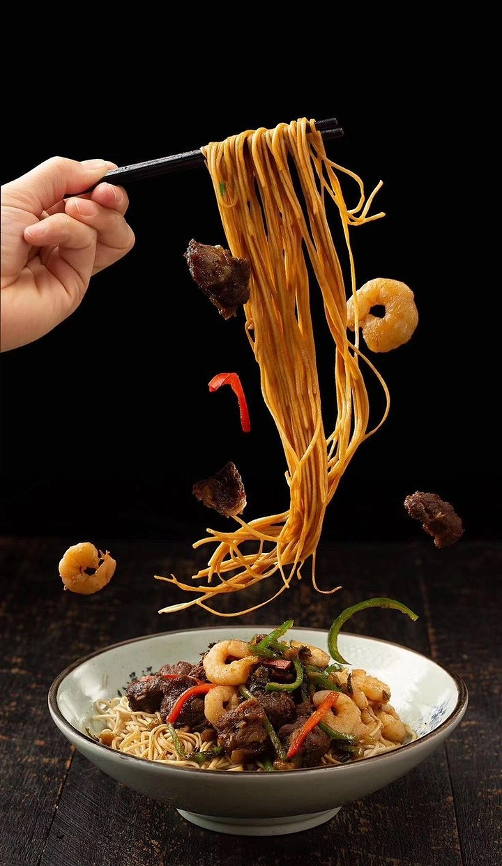 Chinese Restaurants creative ad: Suspended noodles create dramatic product reveal