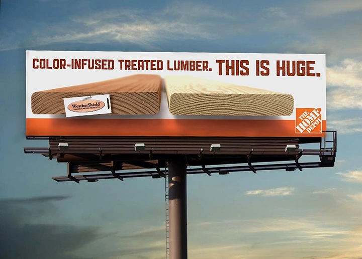 Cement, Steel & Building Materials creative ad: Two giant lumber boards stretching across the billboard