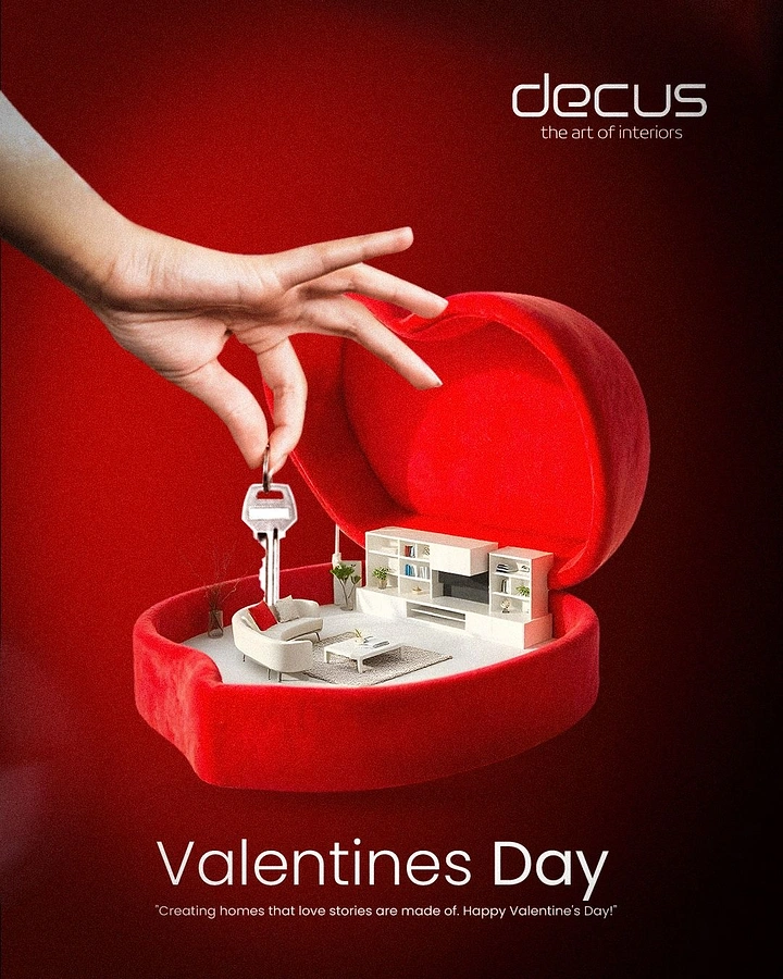 Valentine's Day creative ad: Hand dangling a key over a miniature living room inside a heart box