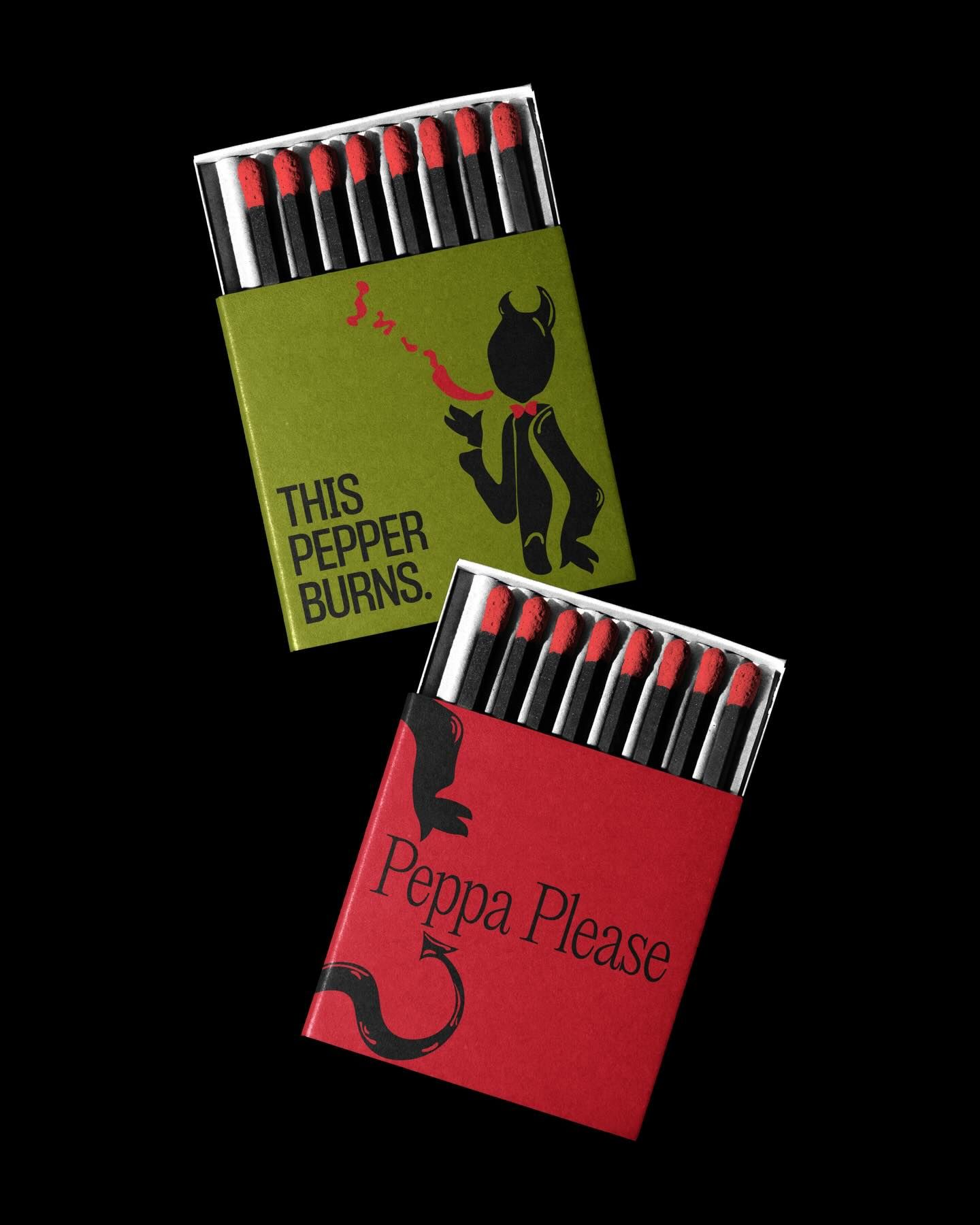 Carousel: Three hot sauce bottles suspended by twine with chillies, slide 3