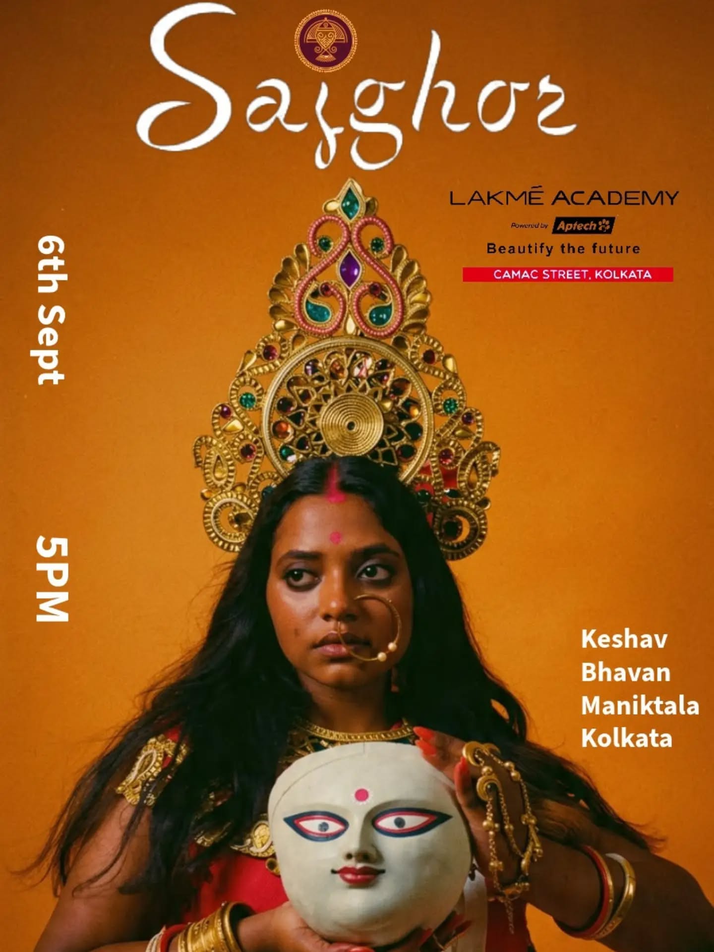 Woman styled as a goddess holding a Durga clay mask
