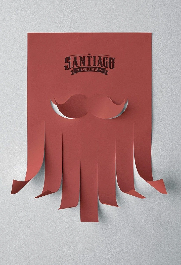 Barber Shops creative ad: Tear-off flyer strips become paper beard