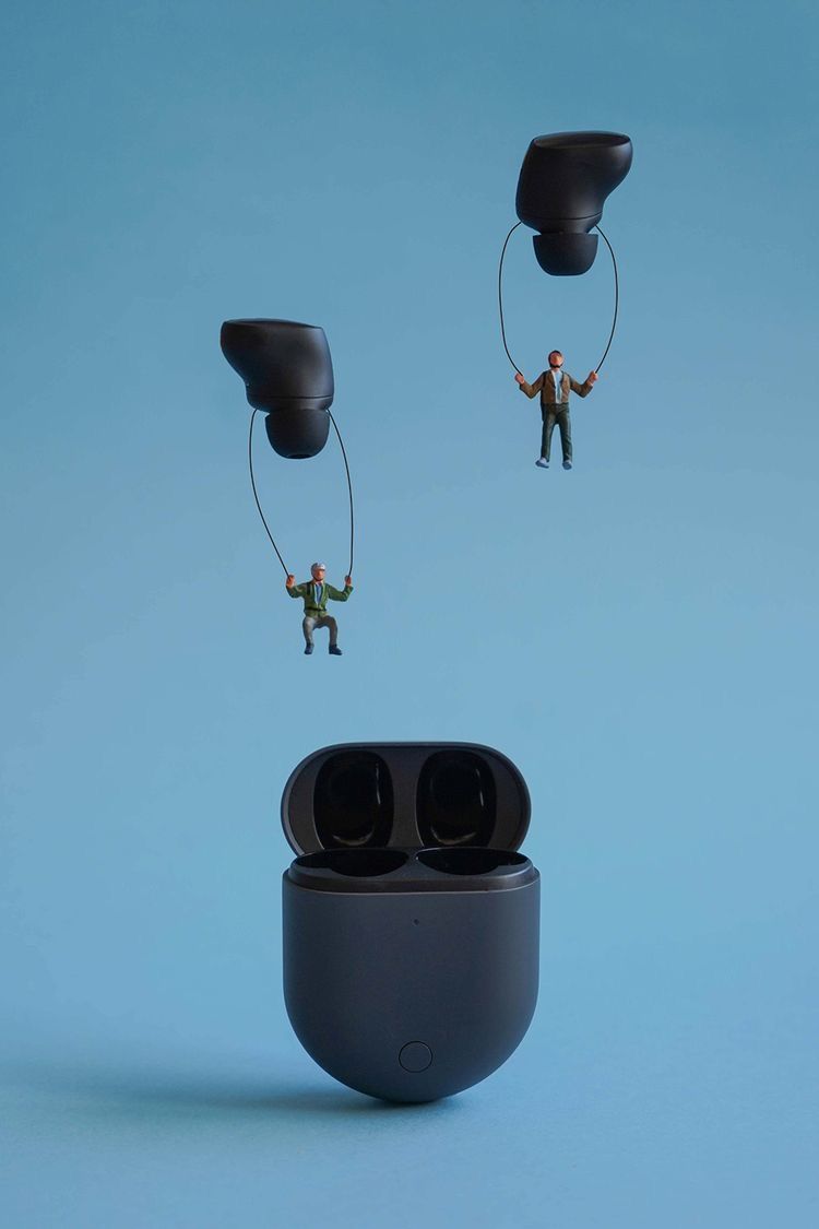 Story: People suspended from earbuds metaphor