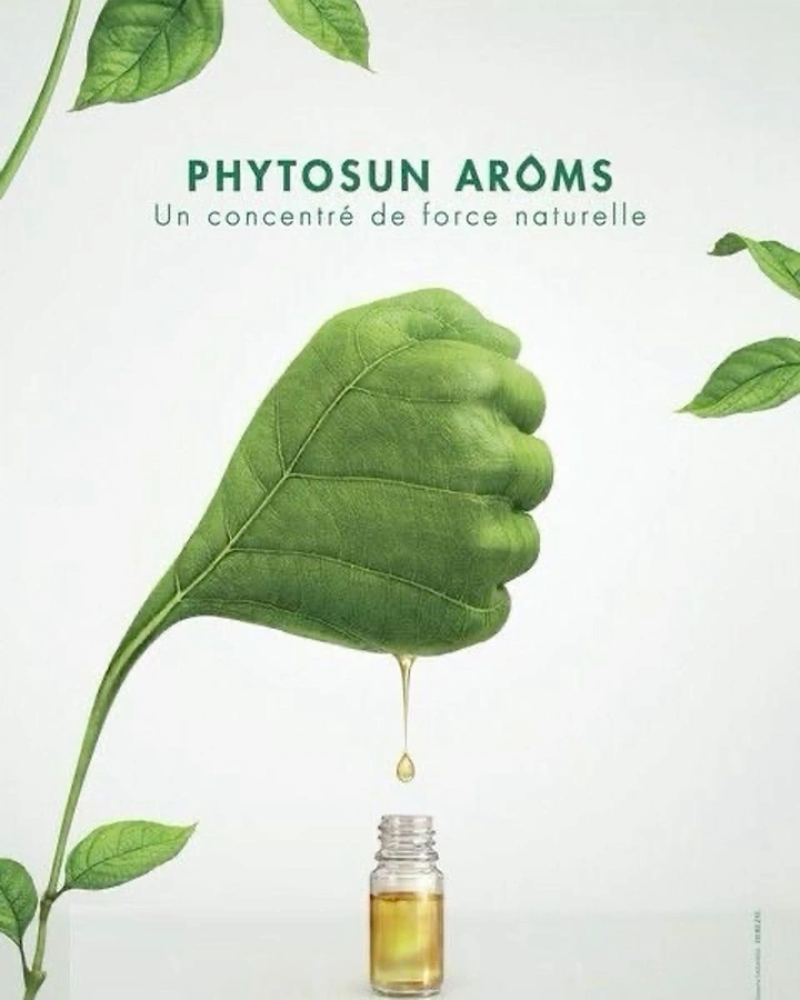 Skincare & Cosmetics creative ad: Green leaf shaped as a fist squeezing an oil drop into a bottle
