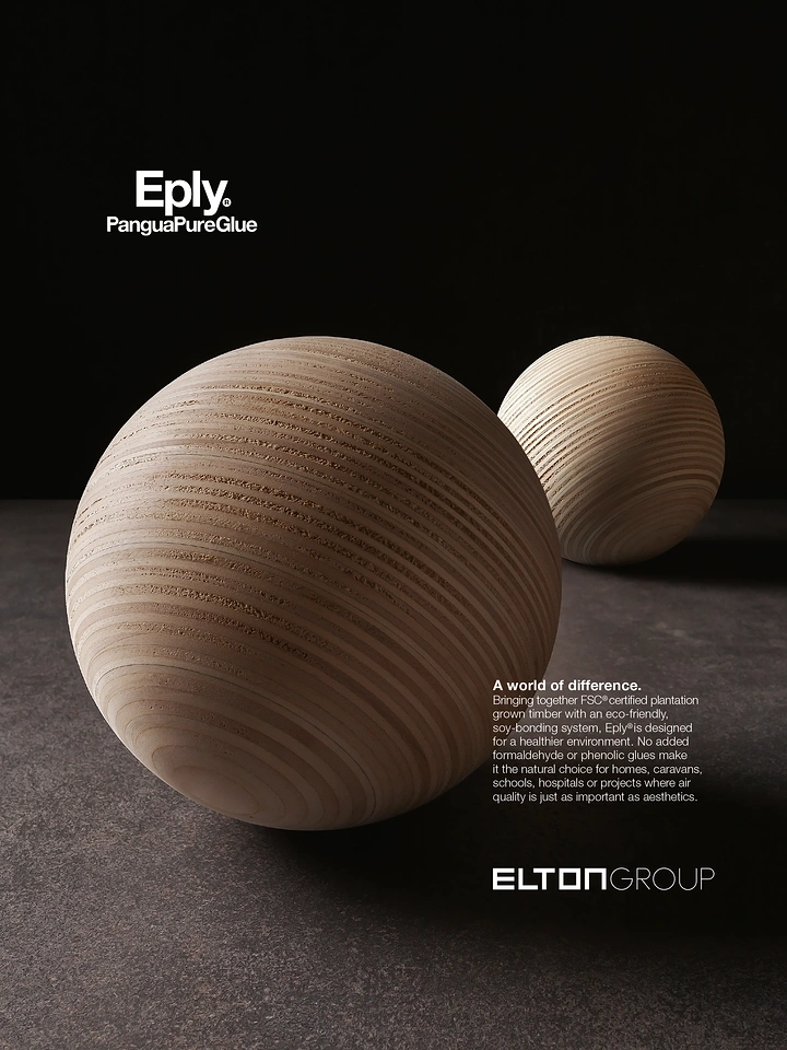 Construction creative ad: Two lathe-turned plywood spheres showing concentric ply layers