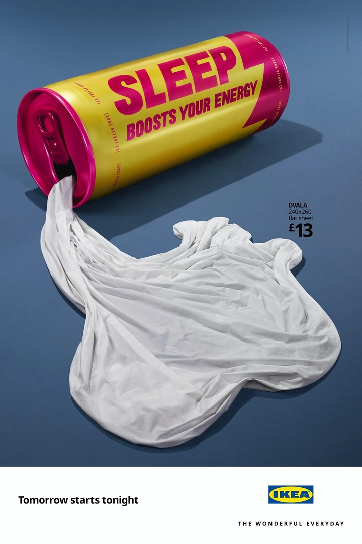 Home Decor creative ad: Energy-drink can spilling a white bedsheet like liquid
