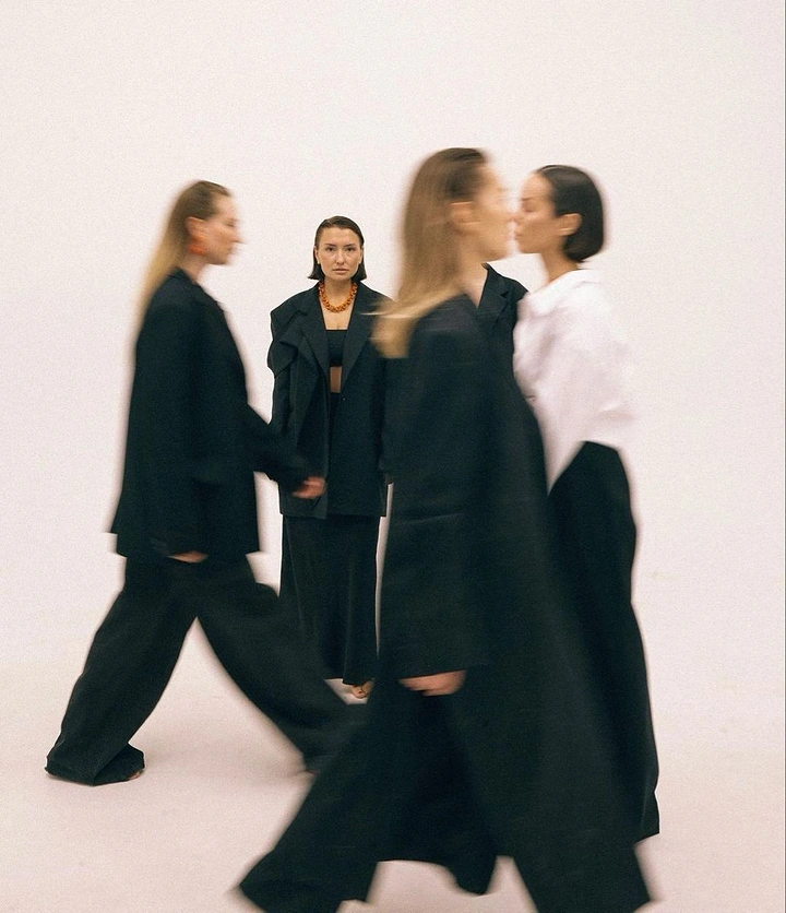 Men's Suits & Formal Wear creative ad: Motion-blur group composition suggests movement