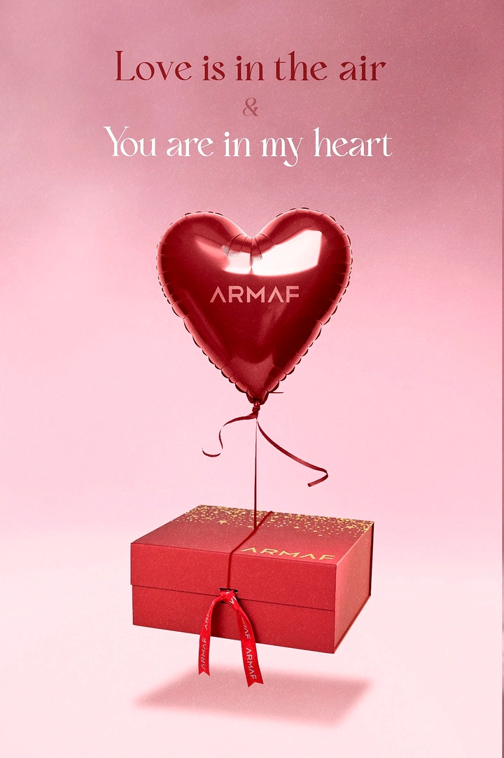 Valentine's Day creative ad: Red foil heart balloon tied to a floating red gift box