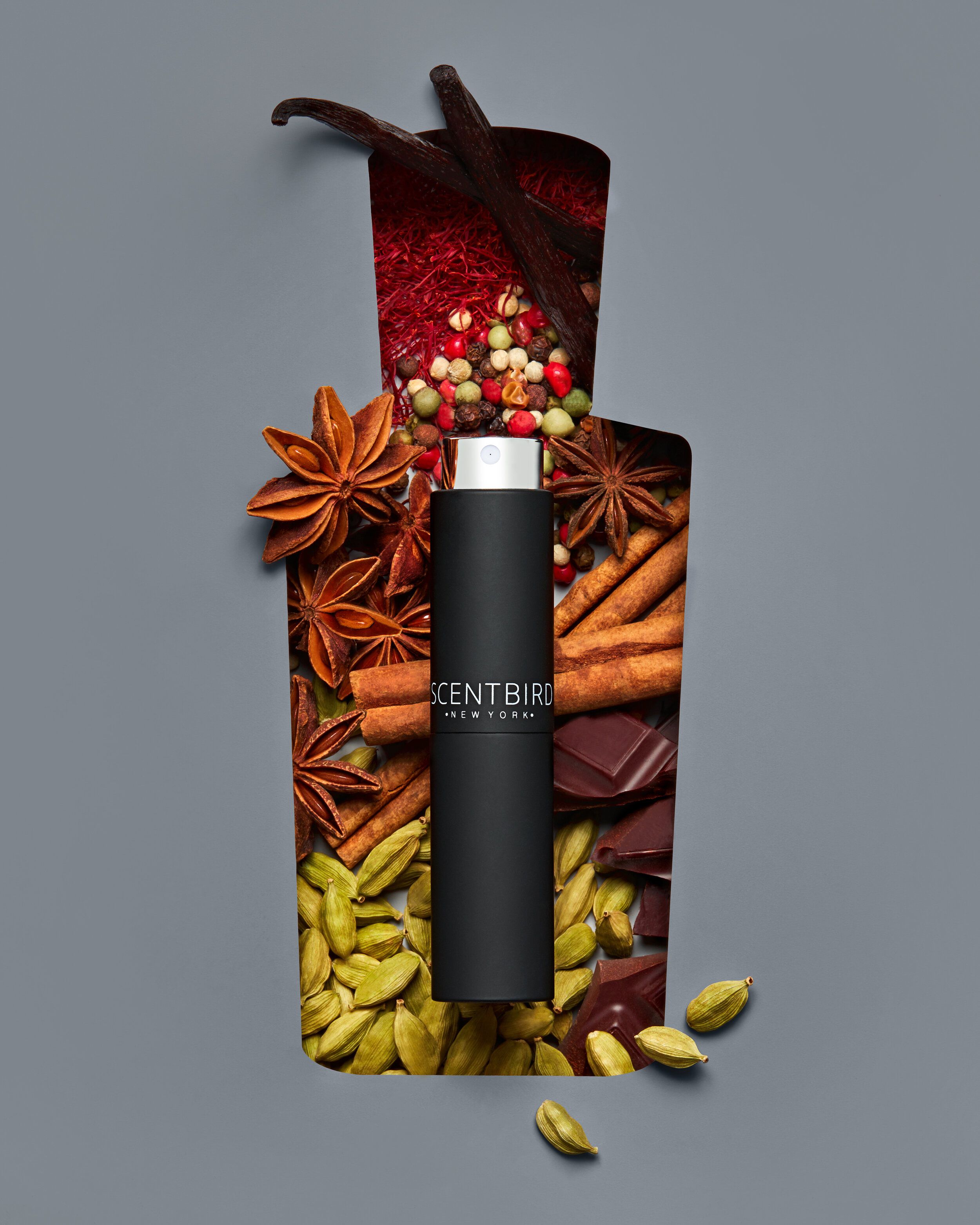 Instagram post: Black atomizer inside a bottle-shaped cutout filled with spices