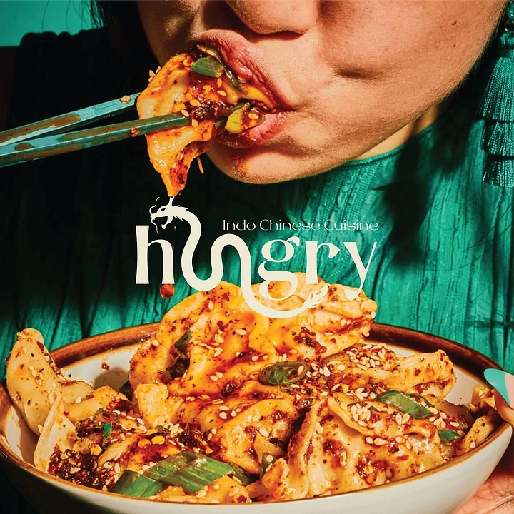 Cloud Kitchens & Food Trucks creative ad: Noodle-lettered 'hungry' with bold photo