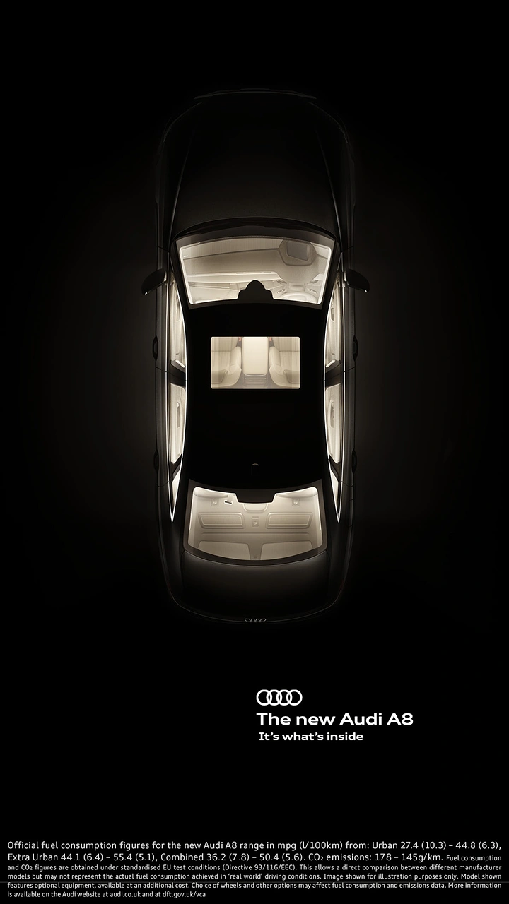 Creative ad: Overhead view of a black sedan with its illuminated interior glowing through the glass