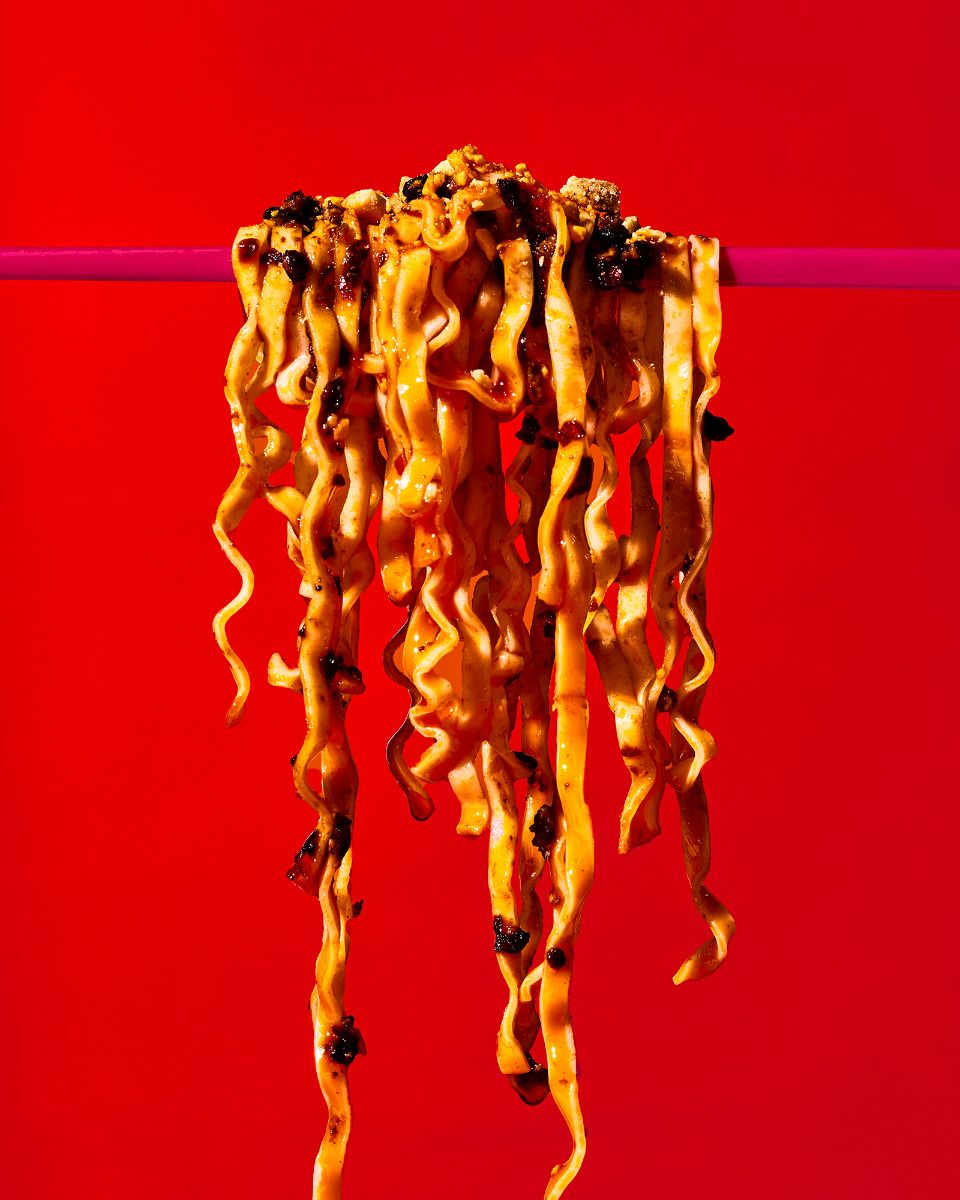 Instagram post: Noodles become a dramatic red sculpture
