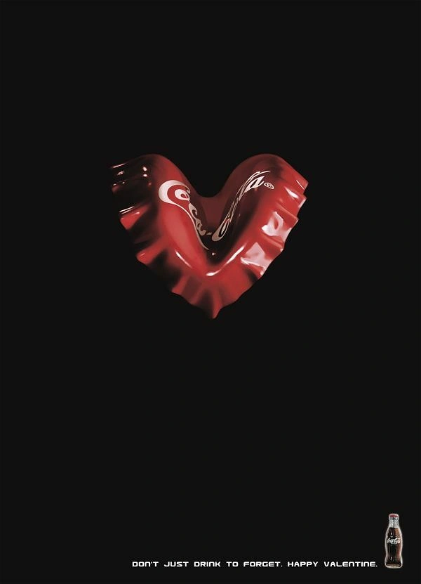 Valentine's Day creative ad: Red crimped bottle cap bent into a heart shape