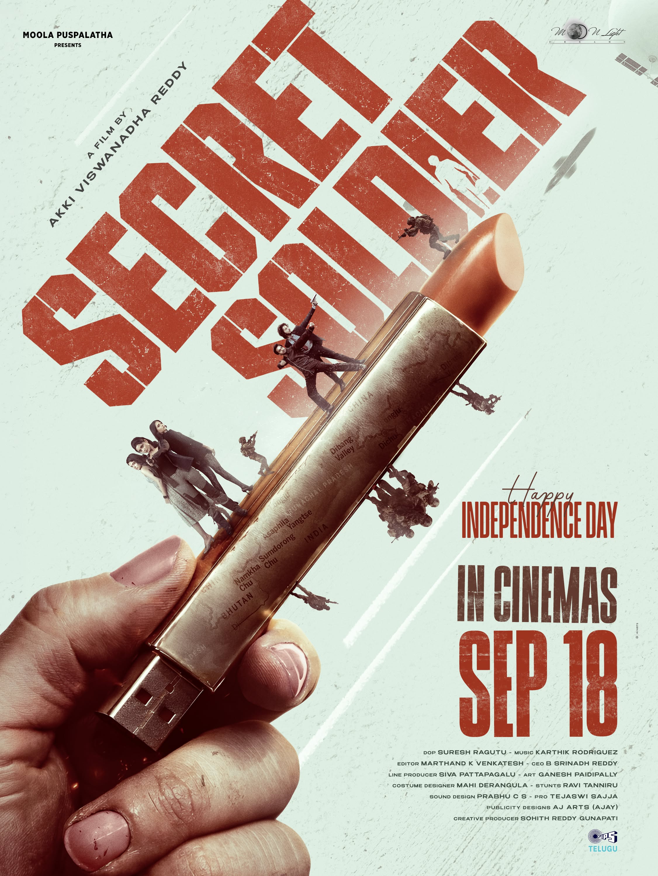Independence Day Poster: A giant lipstick-like USB drive carrying miniature people and landmarks across a map-inspired field