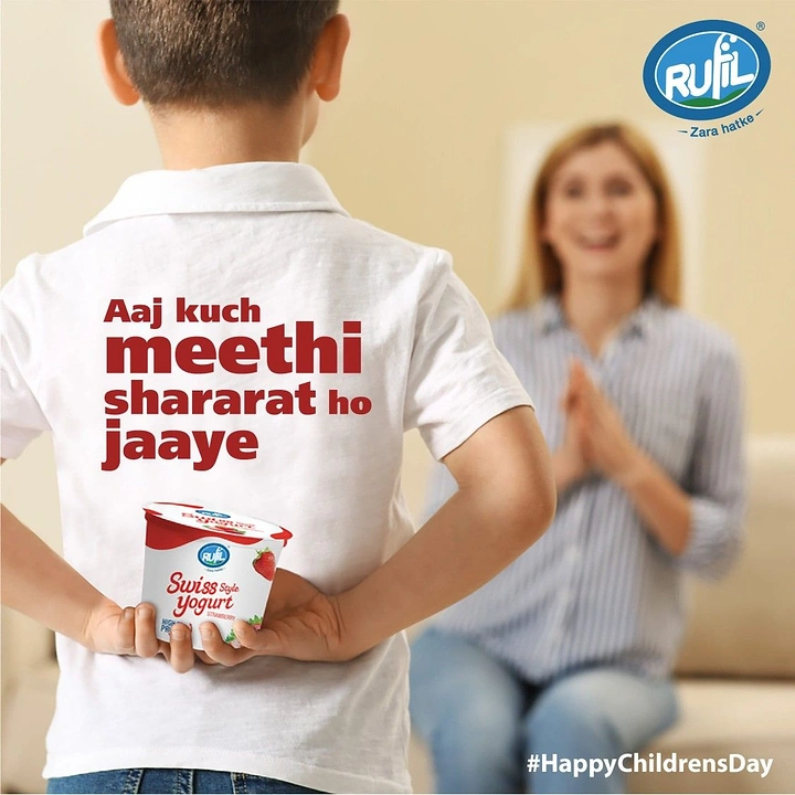 Children's Day creative ad: Boy hiding a yogurt cup behind his back for his mother