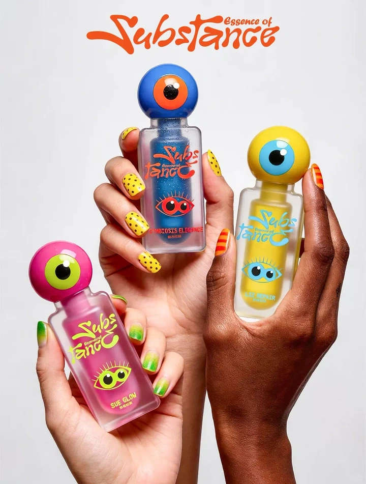Nail Salons creative ad: Three diverse hands holding nail polish bottles with eyeball caps