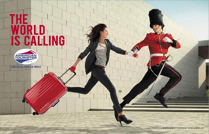 Creative ad: Woman with red suitcase running hand in hand with a royal guard