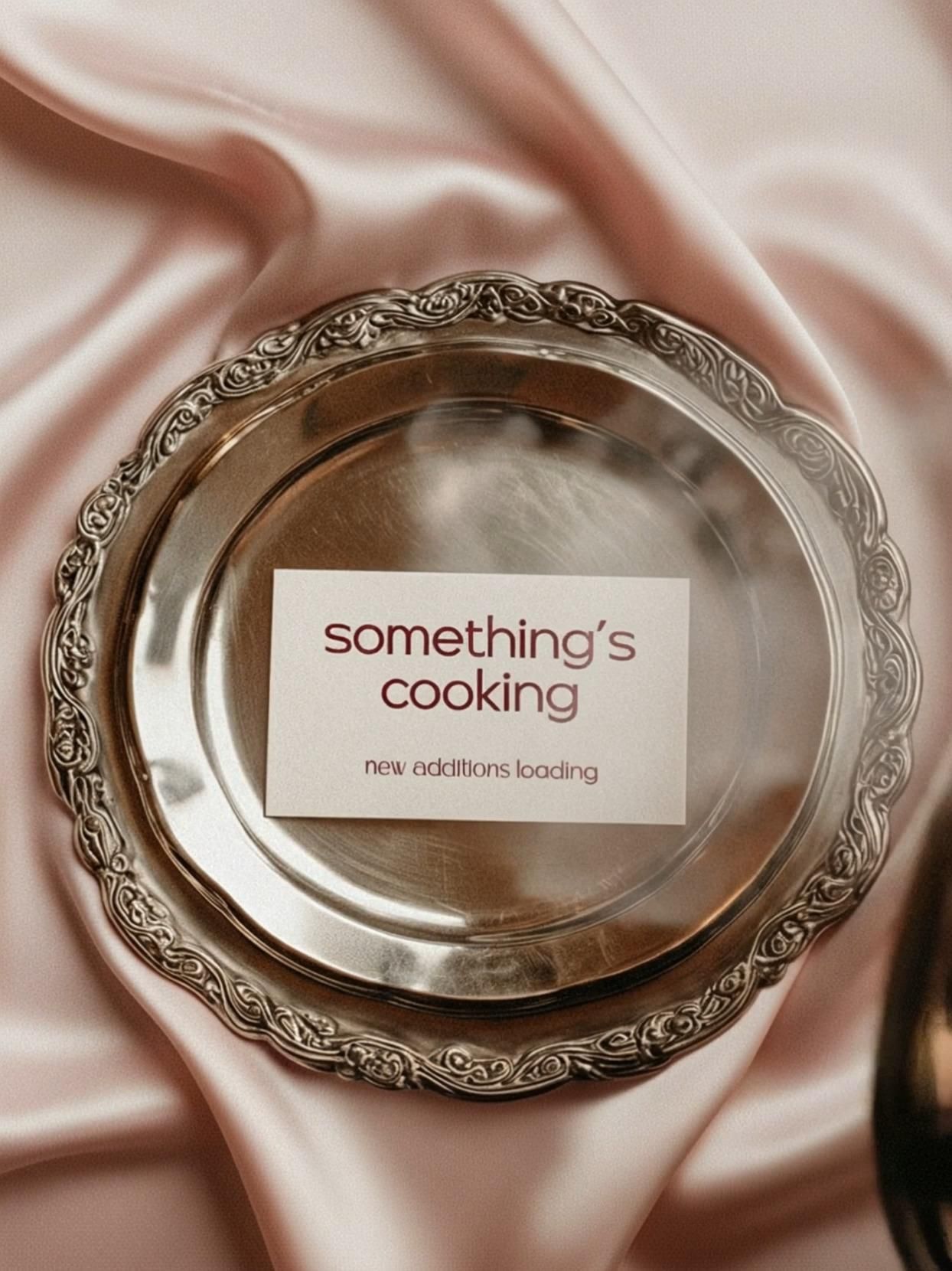 Instagram post: Empty platter teaser, 'something's cooking' pun