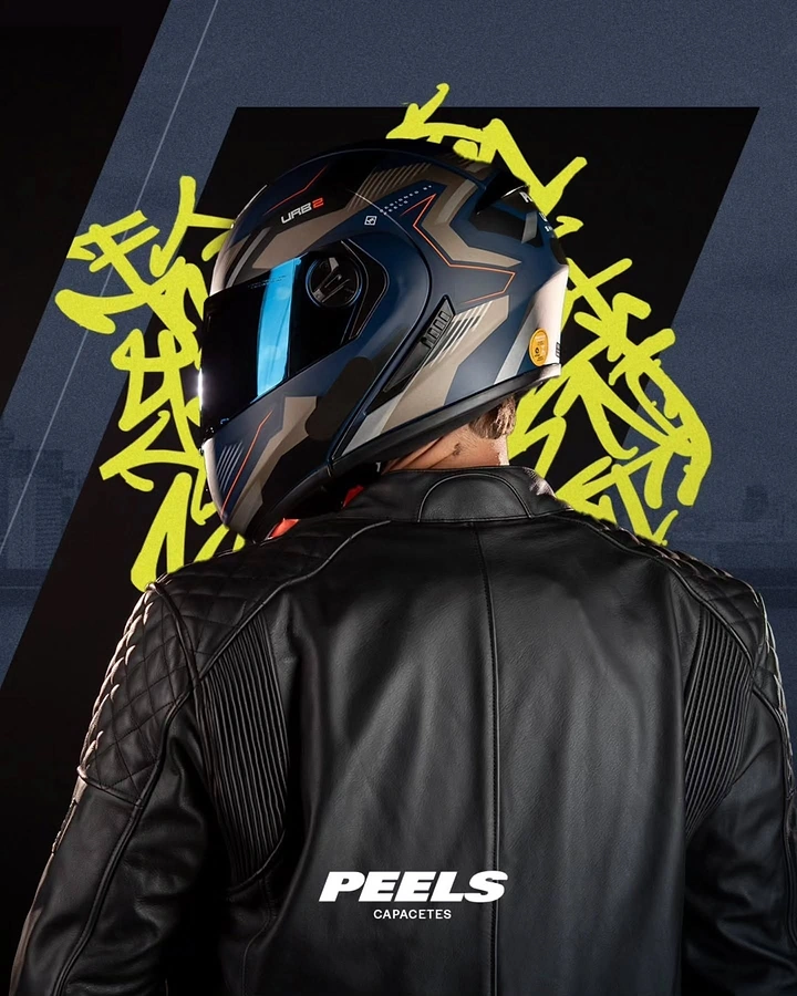 Helmets & Riding Gear creative ad: Helmet embedded in expressive graffiti world