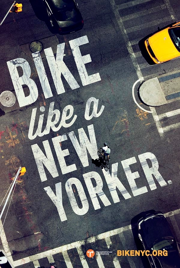 Bicycle Shops creative ad: Top-down view of a city intersection with the headline painted on the asphalt