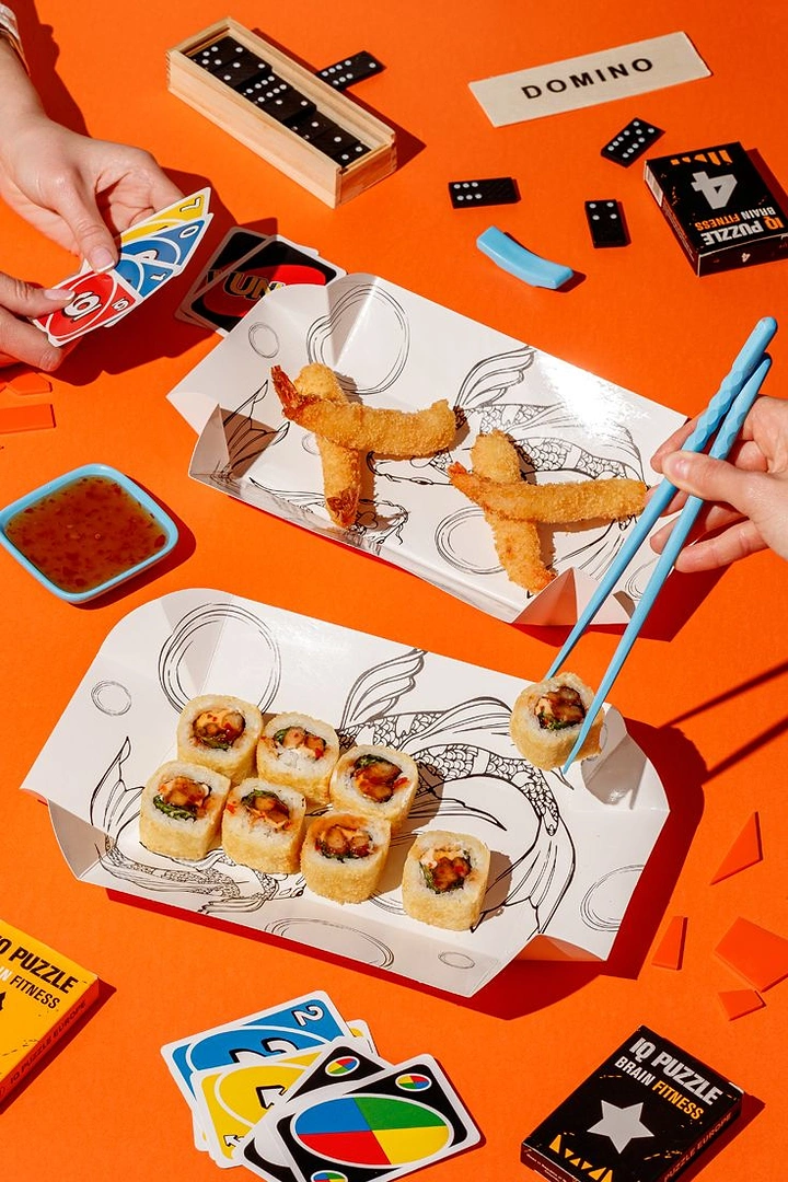 Sushi & Japanese Restaurants creative ad: Sushi transforms a game-night scene