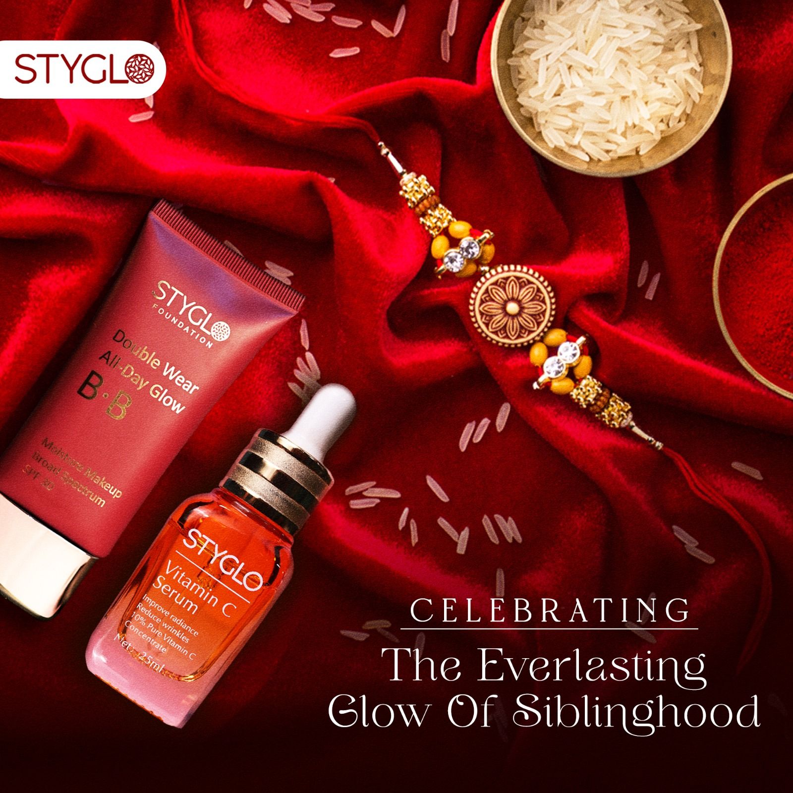 Raksha Bandhan Instagram post: Foundation tube and vitamin C serum beside a rakhi on red velvet