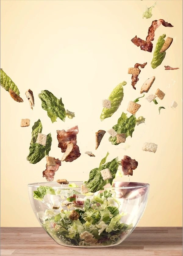 Salad Bars & Healthy Restaurants creative ad: Exploded ingredients visually assemble into bowl