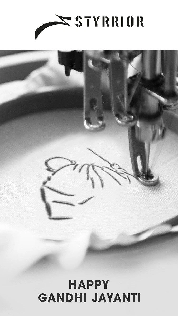 Gandhi Jayanti creative ad: Embroidery machine stitching a Gandhi walking silhouette onto fabric