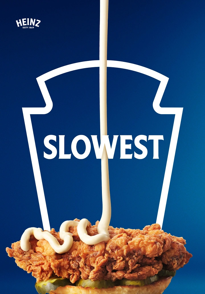 Food & Beverage creative ad: Slow stream of mayo pouring onto a crispy chicken sandwich