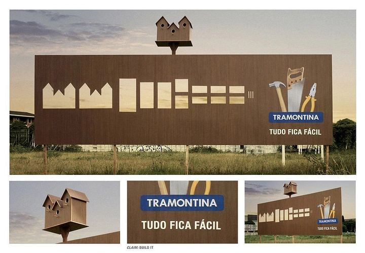 Construction creative ad: Billboard with birdhouse parts cut out of it, assembled birdhouse on top